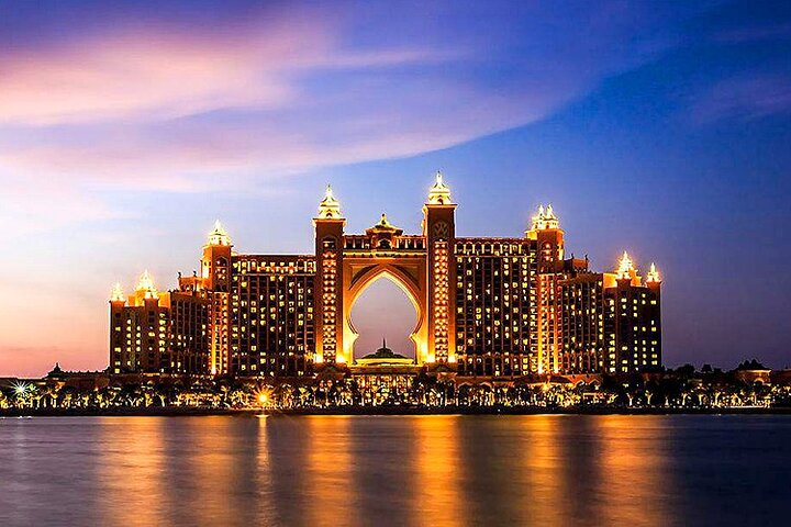 Experience the magic of Dubai nights with stunning views of Atlantis the Palm complemented by exquisite dining and vibrant city sights creating unforgettable memories of this iconic destination.